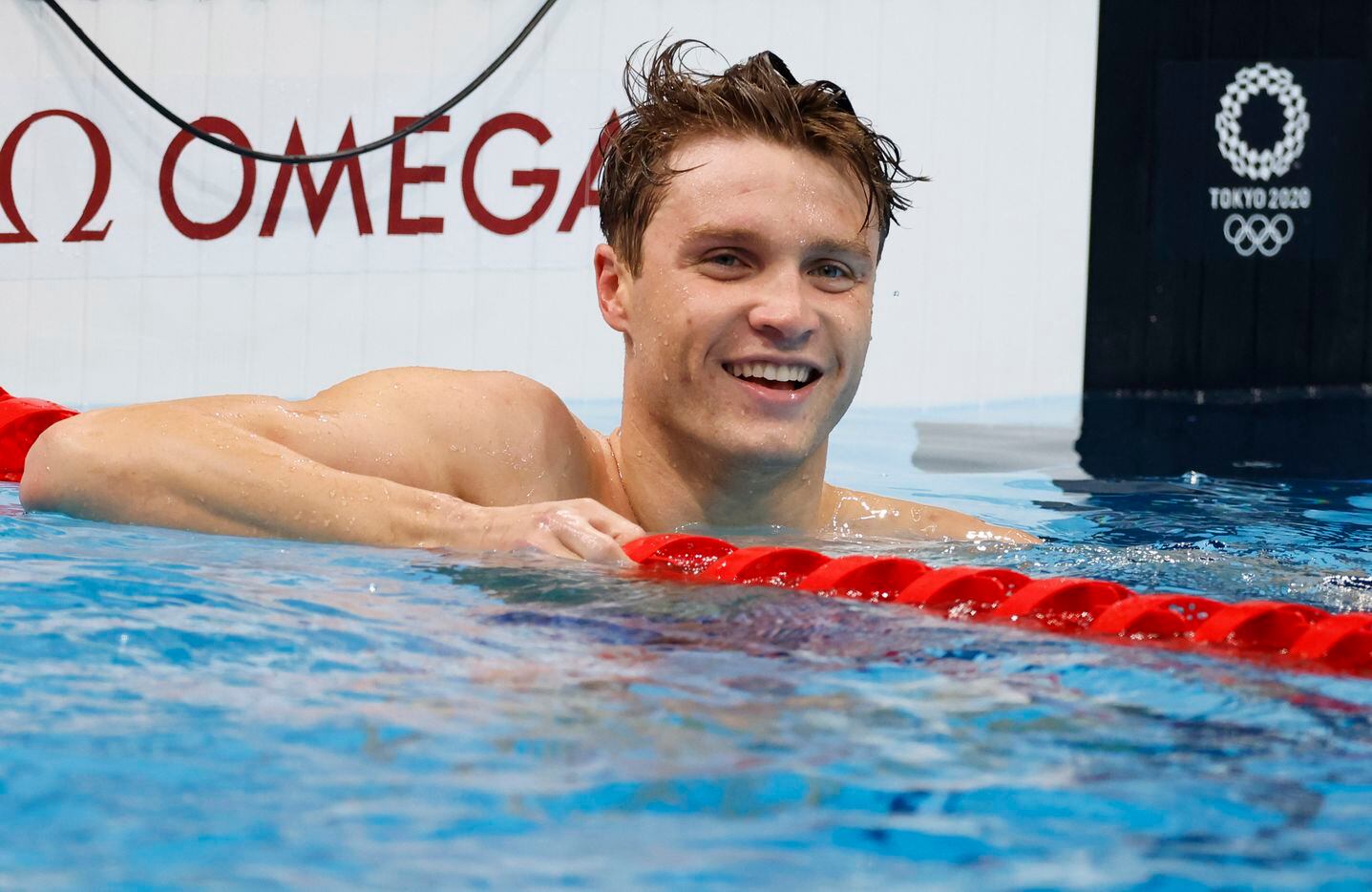 USA’s Robert Finke celebrates after winning the men’s 1500 meter freestyle final during the...