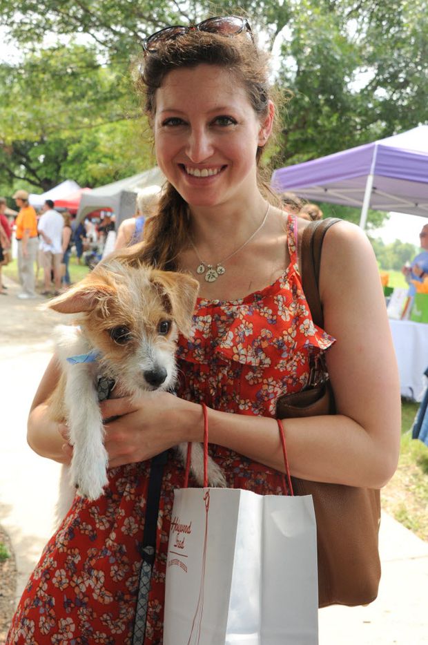 Julie Switkes and her four-month-old pup Huckleberry enjoy the 21st annual Dog Day Afternoon...