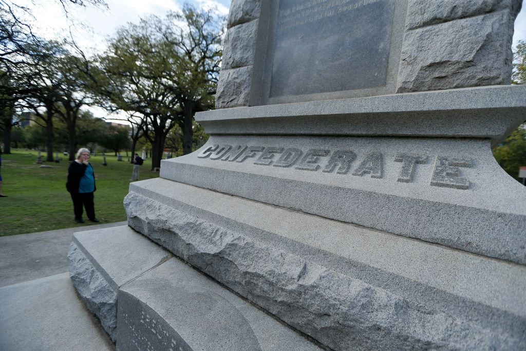 Georgeann Goldsborough of Houston looks at the Confederate War Memorial at Pioneer Park...