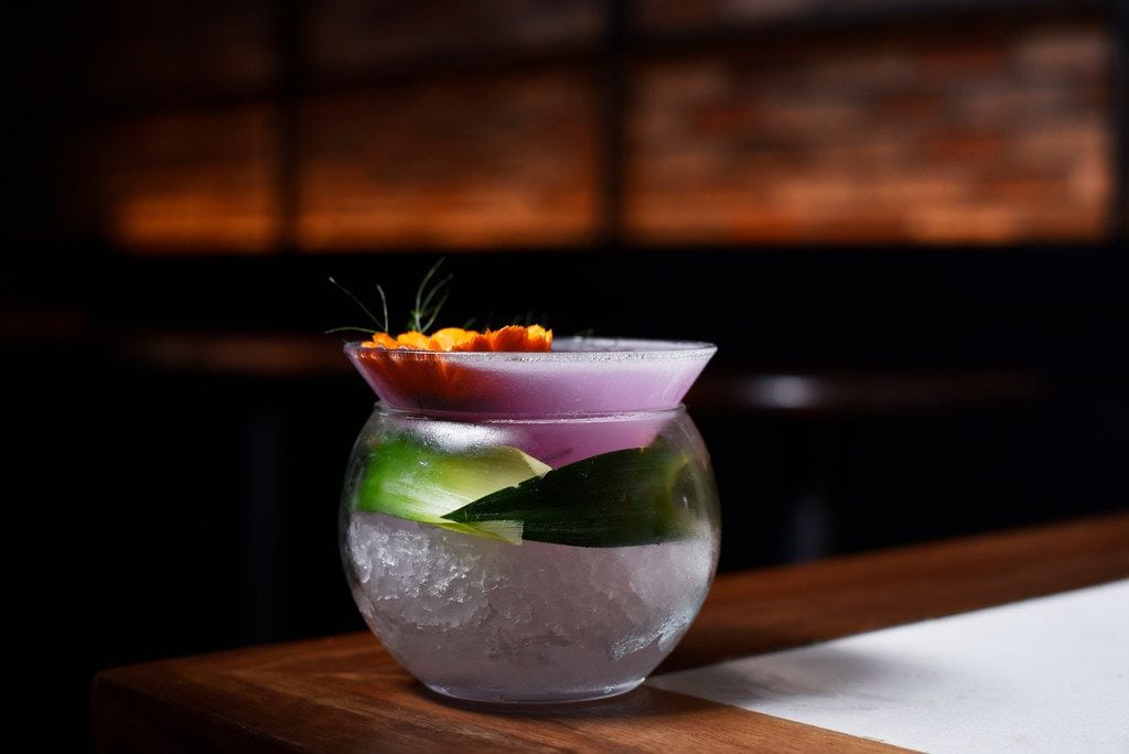 La Purple Drink, served with charanda, butterfly pea flower, lime juice and pineapple syrup...