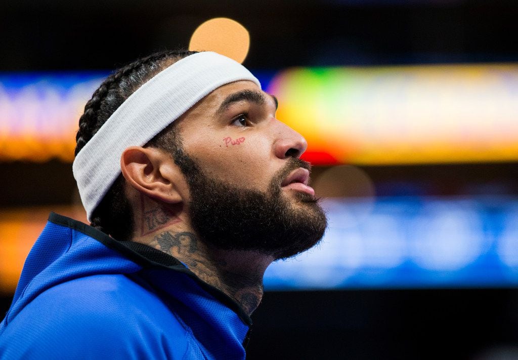 Dallas Mavericks center Willie Cauley-Stein (33) looks up as he warms up before an NBA game...