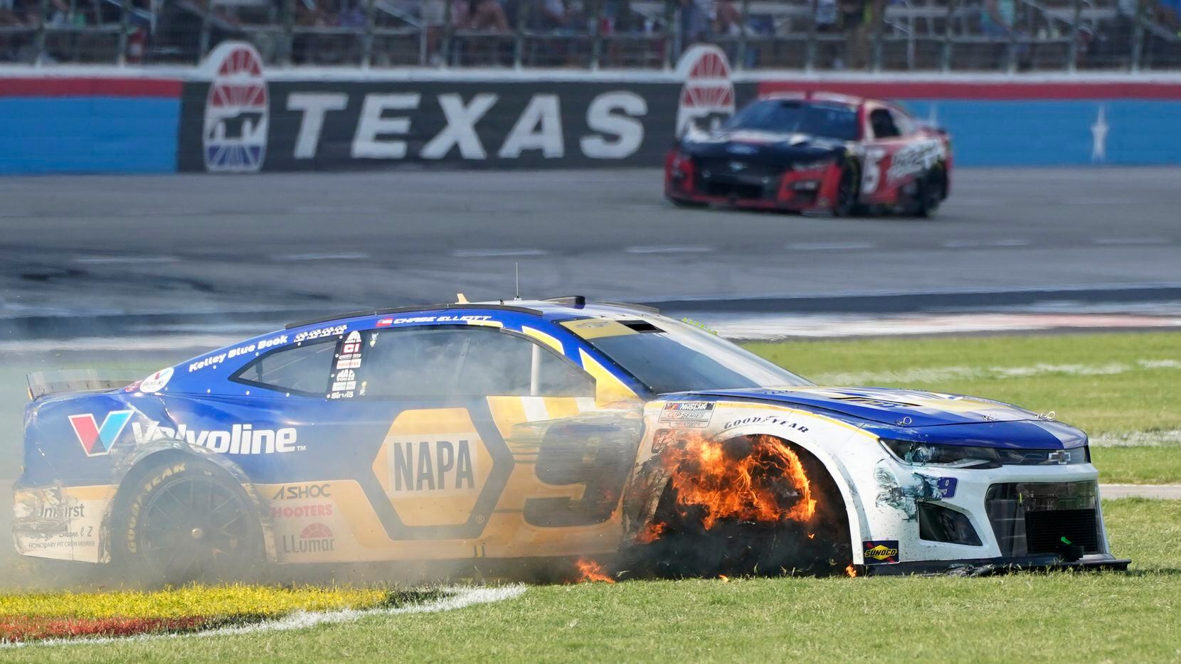 Chase Elliott's tire burns after he contacted the wall during the NASCAR Cup Series auto...