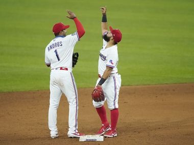 Texas Rangers shortstop Elvis Andrus and second baseman Rougned Odor celebrate after a 2-0 victory over the against the Los Angeles Angels at Globe Life Field on Saturday, Aug. 8, 2020.
