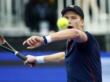 Jenson Brooksby returns the ball during the finals of the ATP Dallas Open against Reilly...
