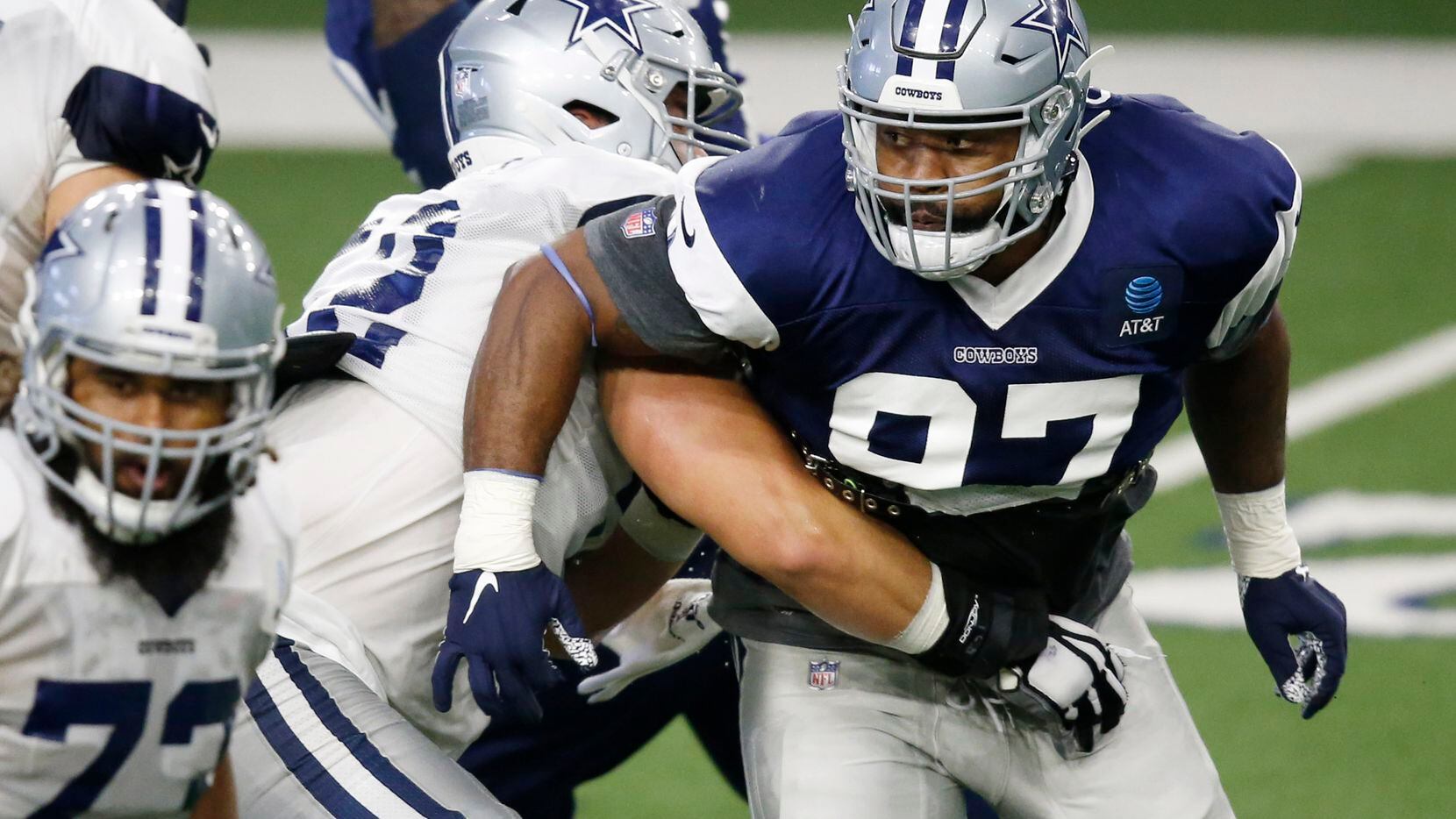 Cowboys defensive end Everson Griffen (97) tries to get around Cowboys guard Connor Williams...