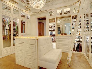 This posh closet is part of the primary suite inside the home at 6401 Westcoat Drive in...