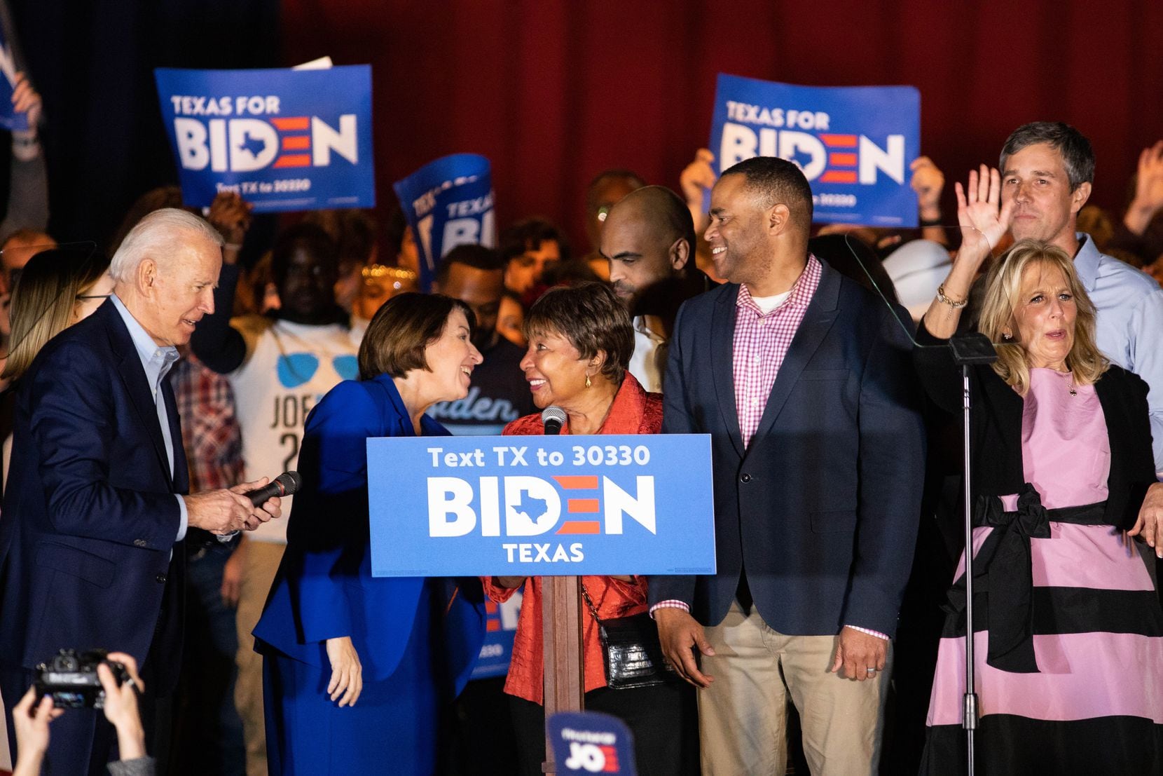 Democratic presidential primary candidate Joe Biden (far left) was endorsed by (from left) Sen. Amy Klobuchar (D-MN), Rep. Eddie Bernice Johnson (D-Dallas), Rep. Colin Allred (D-Dallas), Rep. Mark Veasey (D-Fort Worth) and former Rep. Beto O'Rourke of El Paso during a rally at Gilley's in Dallas on Tuesday. Biden's wife, Jill, is at far right.