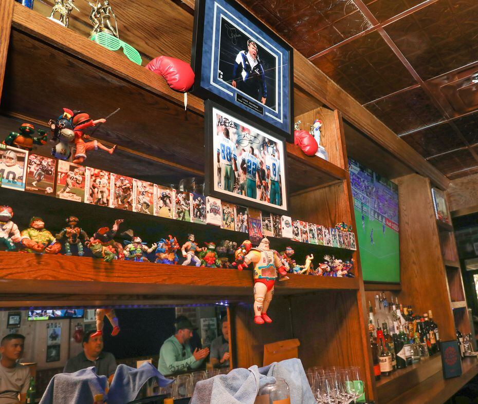 There's a small shrine to Jimmy Johnson and the Dallas Cowboys in the middle of the bar at...