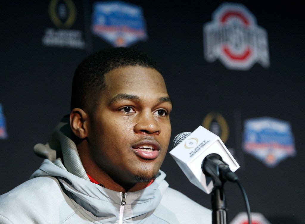 Ohio State's Raekwon McMillan speaks to the media after arriving with his team at Phoenix...