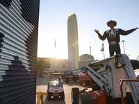 Big Tex stands ready to greet the public as final preperations are made around Fair Park,...