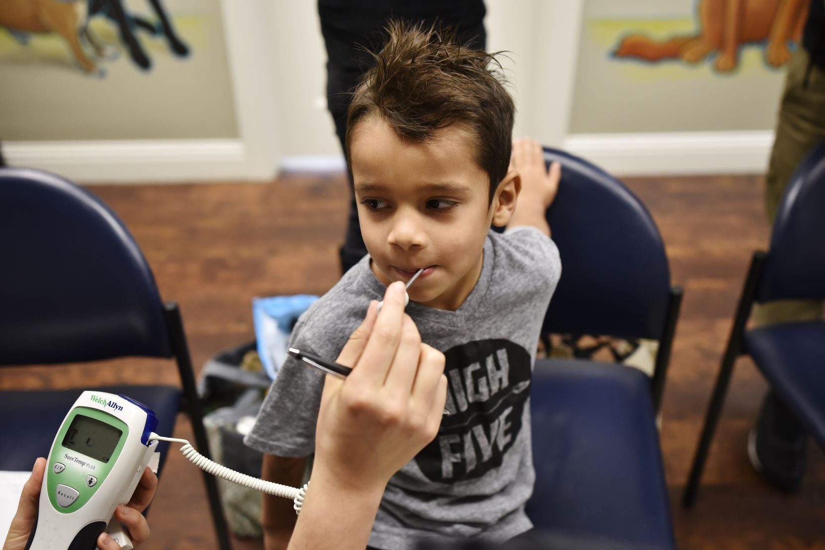 Samuel Bonilla has his vitals checked during a visit on Oct. 22, 2019 at Agape Clinic, a private health center where no one is turned away because of tight finances.