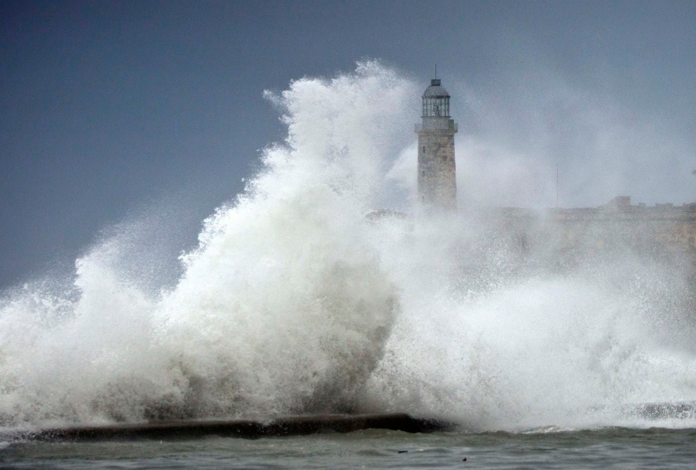 Waves crash into El Morro after the passing of Hurricane Irma, in Havana, Cuba, Sunday,...