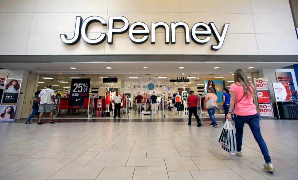 In this Wednesday, June 7, 2017, photo, shoppers walk into a J.C. Penney department store in...