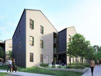 Buildings in The Elms, an upcoming community in Cedar Crest, step down the hillside toward a...