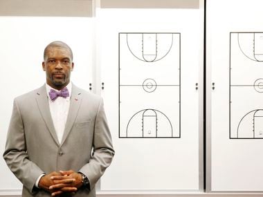 Travis Mays stands for a portrait after being introduced as head coach of the women's basketball team at SMU in Moody Coliseum in Dallas Friday April 8, 2016.