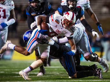 SMU's Camar Wheaton (0) carries the ball against BYU during the first half of the New Mexico...