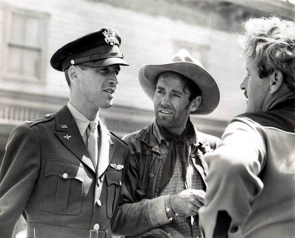 Before deploying overseas in World War II, James Stewart visited his friend Henry Fonda on the set of The Ox-Bow Incident and met with director William Wellman.  (Leonard Maltin collection. Provided by Simon & Schuster)