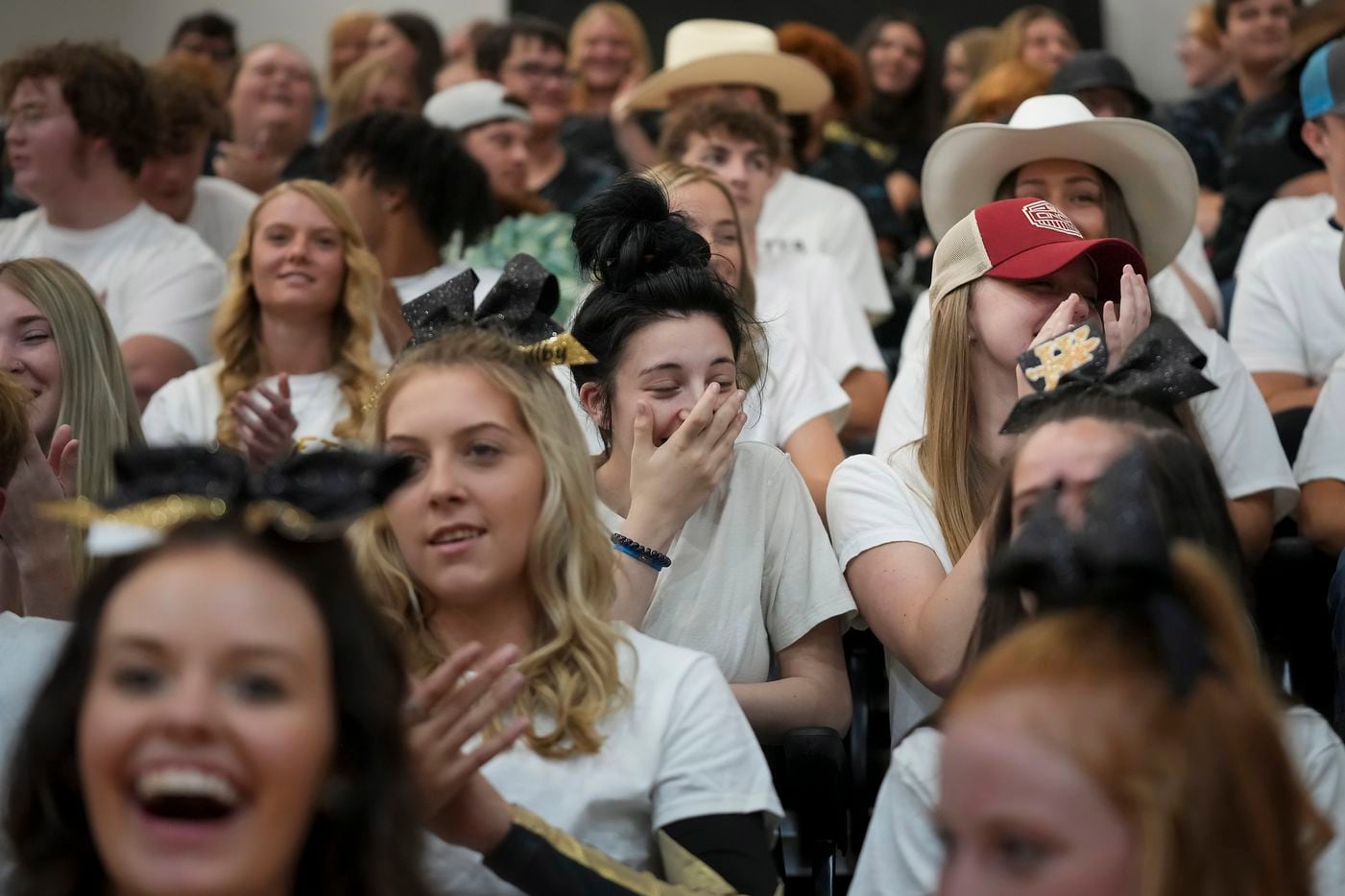 Students react after Troy Aikman announced that Blake Shelton will headline a music festival in their town.
