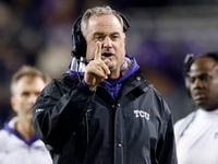 TCU Horned Frogs head coach Sonny Dykes signals to an official along the sideline during the...