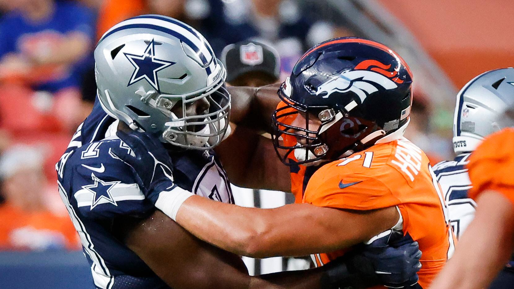 Dallas Cowboys rookie offensive tackle Tyler Smith (73) battles Denver Broncos defensive end...