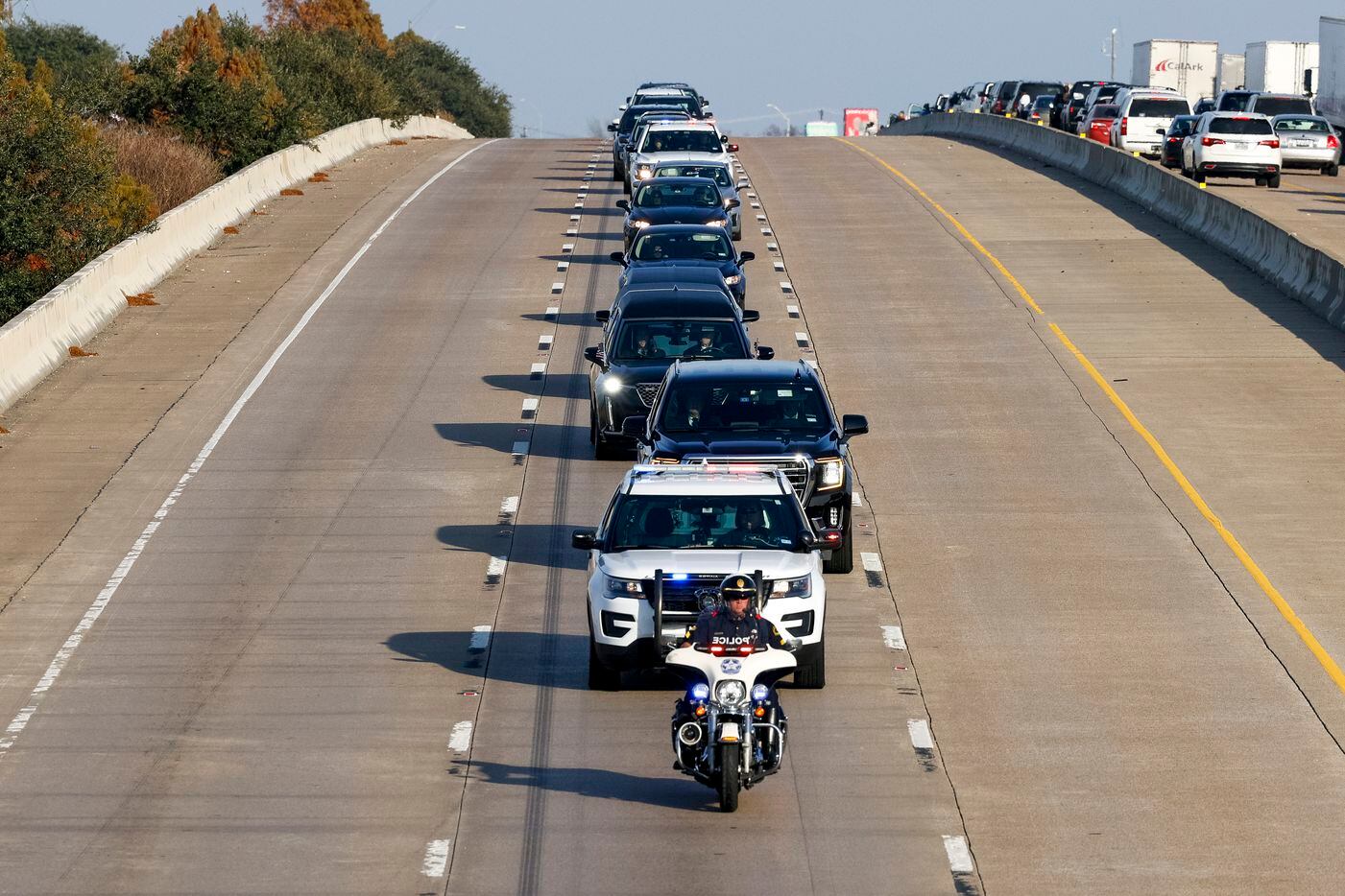 Mesquite police officers lead the funeral procession for Mesquite police officer Richard...
