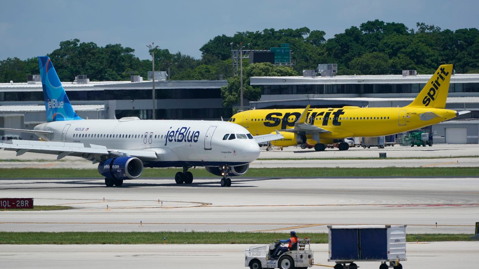JetBlue is expected to repaint Spirit planes and fold its pilots and other employees into...