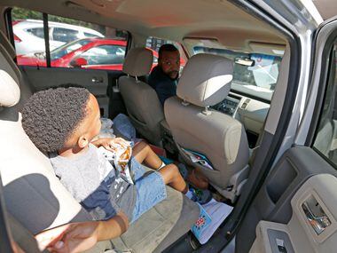 Attorney Lee Merritt (top) tells his 7-year-old son Stacy Merritt, Jr., have a seatbelt on...