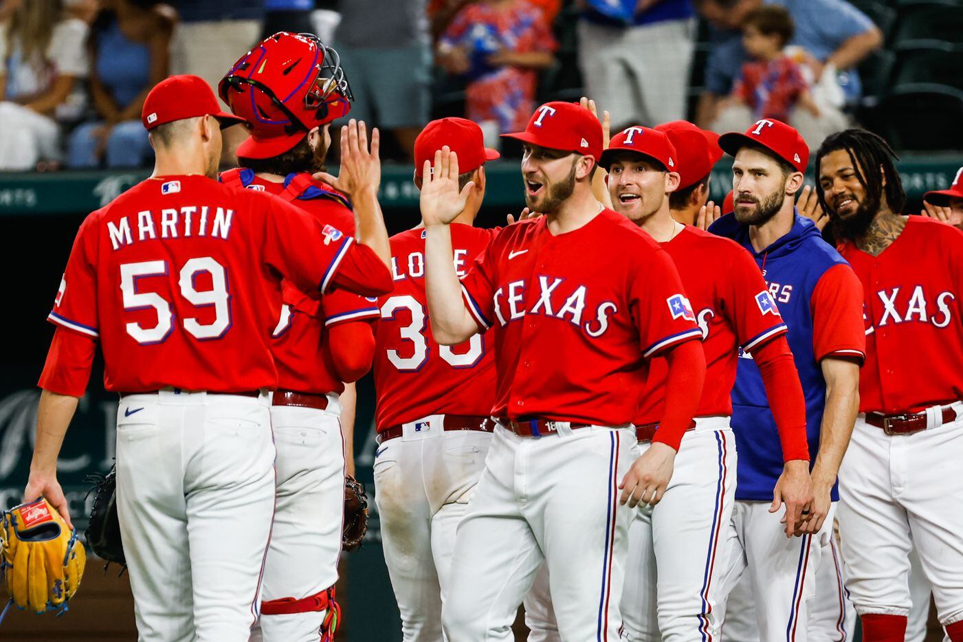 Texas Rangers celebrates a win 6 to 5 over Minnesota Twins at the Globe Life Field in...