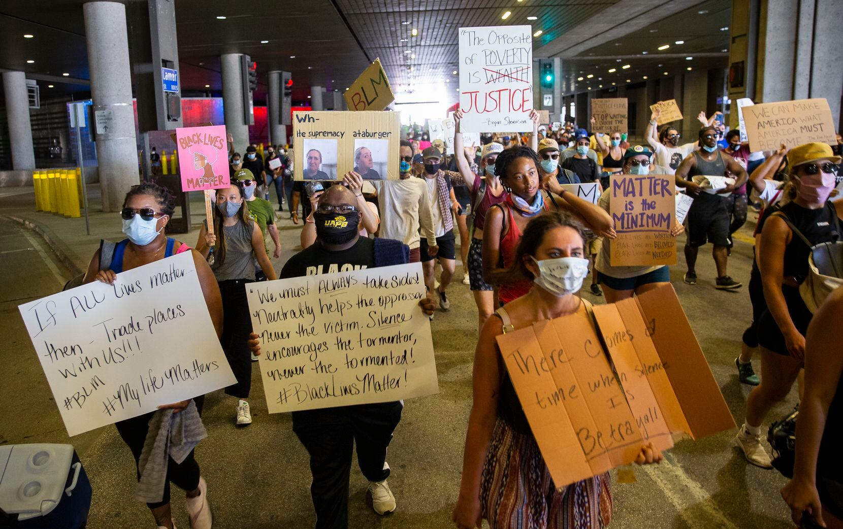 Protestors march during the National Injustice Peaceful Rally demonstrating against police brutality and the recent police killings of George Floyd and Breonna Taylor on N. Lamar St. in downtown Dallas on Sunday, June 7, 2020. (Juan Figueroa/The Dallas Morning News)