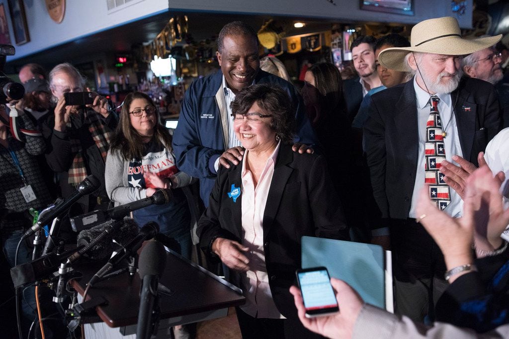 Gubernatorial Candidate Lupe Valdez and State Senator Royce West leave the podium during a...