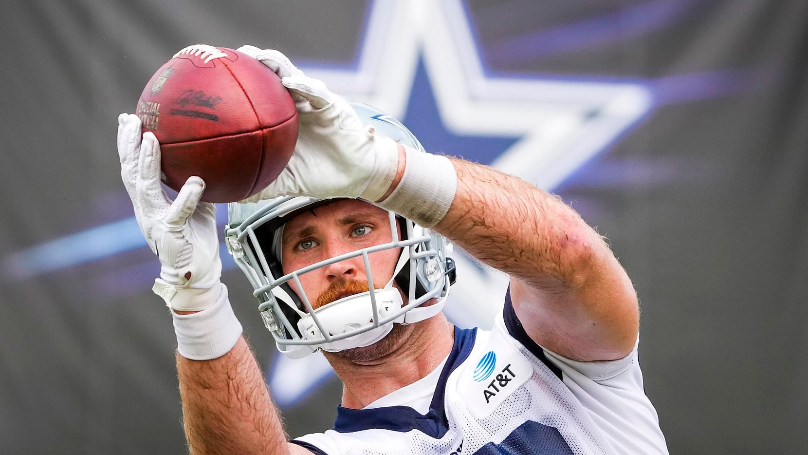 Dallas Cowboys tight end Dalton Schultz catches a pass during a practice at training camp on...