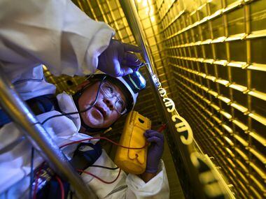 Jaehoon Yu, UT-Arlington professor of physics, at work on the DUNE prototype detector at...
