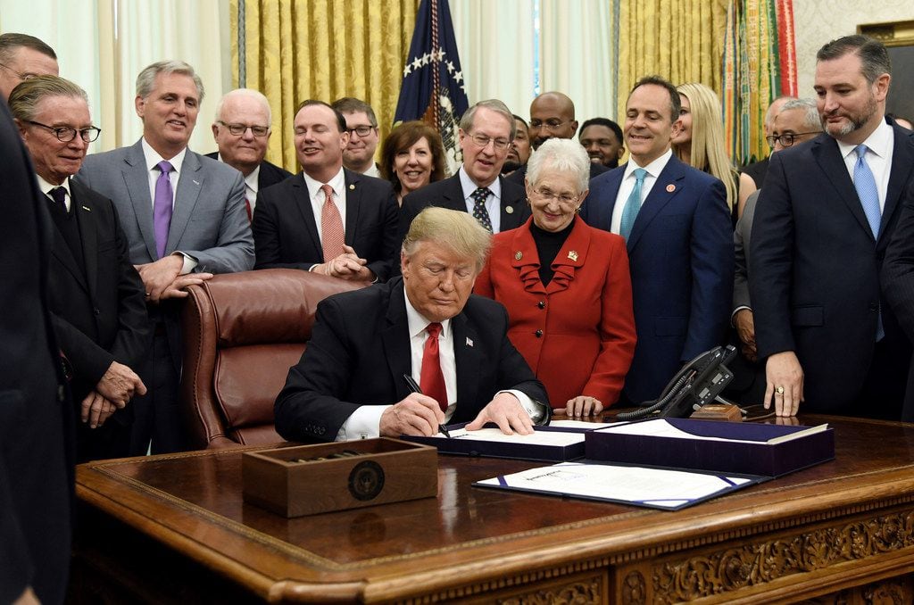 President Donald Trump signed criminal justice overhaul measures in the Oval Office on...