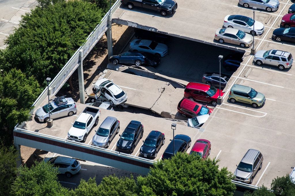 Emergency crews respond to a collapsed parking garage at 4545 Fuller Rd in Irving, Texas on...