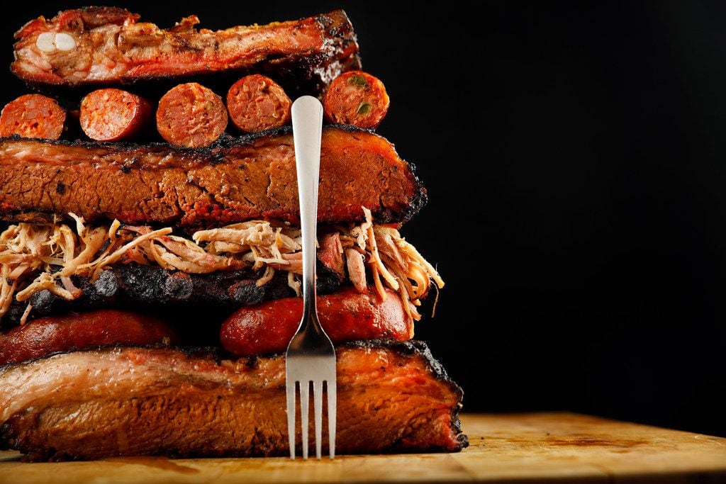 Brisket, ribs, pulled pork and sausage are piled high. Barbecue can be used as a main staple...