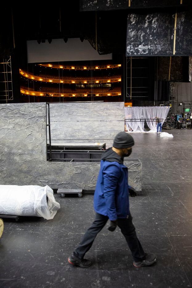 Sean Oakry walks back to unload set pieces made by Dallas Stage Scenery for Dallas Opera’s...
