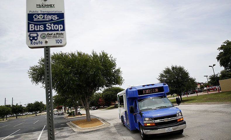  A Texoma Area Paratransit System (TAPS) bus arrives at a stop on University Boulevard in...