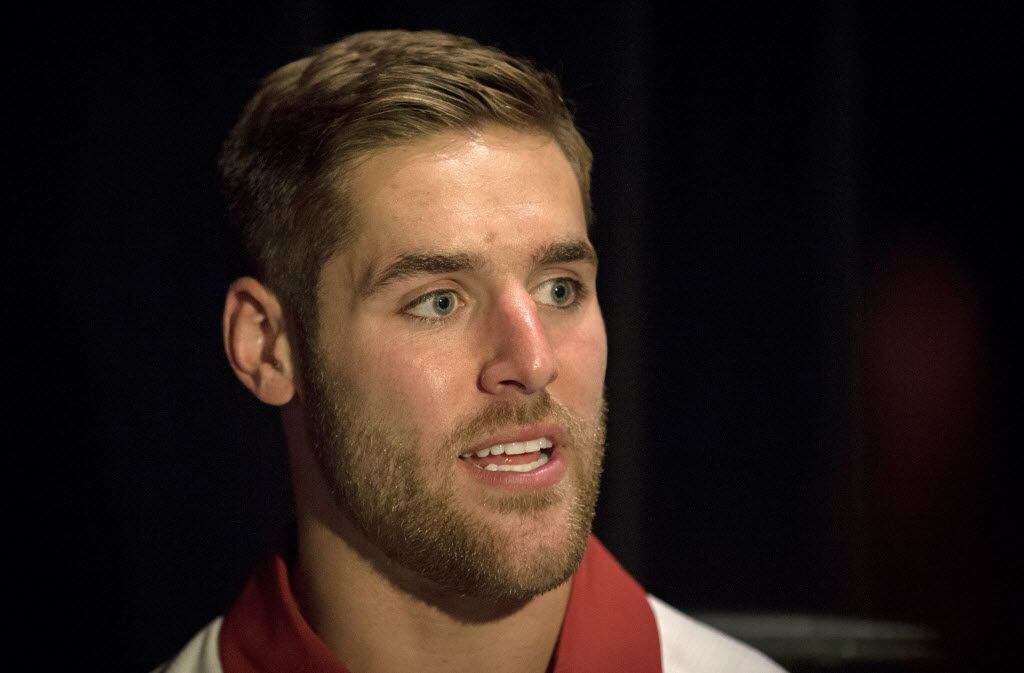 Oklahoma quarterback Trevor Knight speaks with reporters during the 2015 Big 12 Conference...