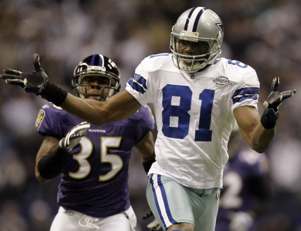 Cowboys wide receiver Terrell Owens gestures after a long pass falls incomplete in a home...