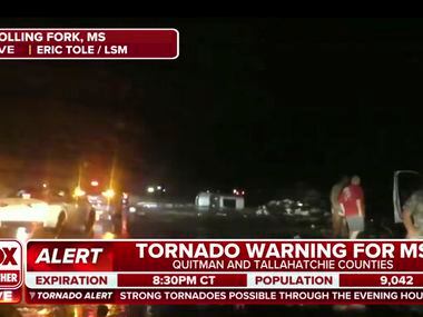 This screen grab from video broadcast by Fox Weather shows the immediate aftermath of severe...