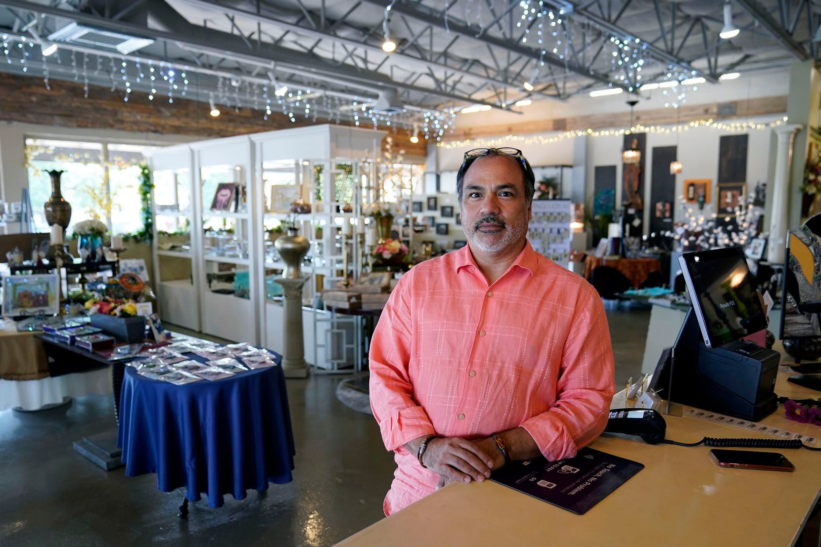 Martin Garcia, owner of gift and décor store Gramercy Gift Gallery in San Antonio, paid his...