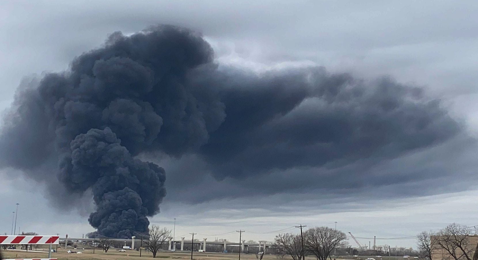 The smoke billowing from a five-alarm fire at a recycling facility in East Fort Worth was...