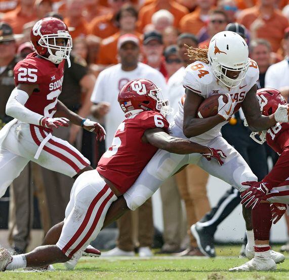 Texas Longhorns and the Oklahoma Sooners met in the 2018 Red River Showdown in the Cotton...