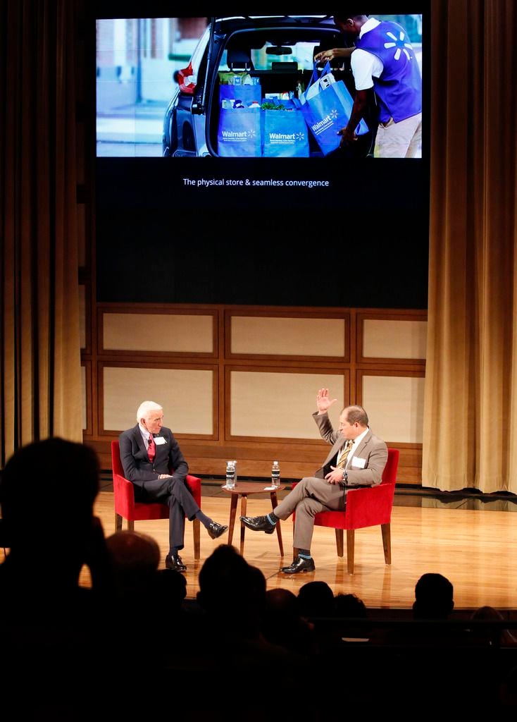 Walmart's JP Suarez (right) answers questions during a chat with Herb Weitzman during the Weitzman Annual D-FW Retail Forecast breakfast at the George W. Bush Presidential Center.