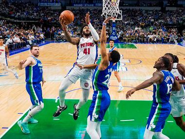 Detroit Pistons forward Saddiq Bey (41) drives to the basket against Dallas Mavericks guard...