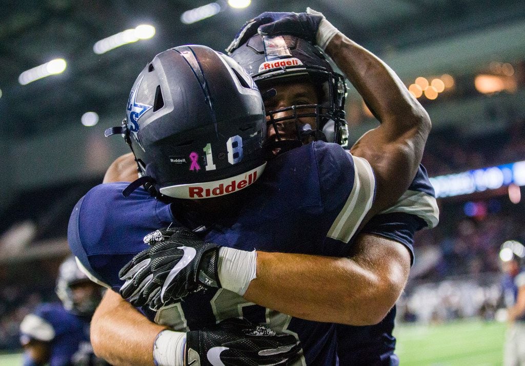 Frisco Lone Star wide receiver Marvin Mims (18) celebrates after running to the end zone...