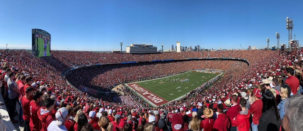Fans watch as Texas Longhorns and Oklahoma Sooners compete in the opening drive in the Red River Showdown at the Cotton Bowl in Dallas on Saturday, October 12, 2019. Oklahoma Sooners defeated Texas Longhorns 34-27.