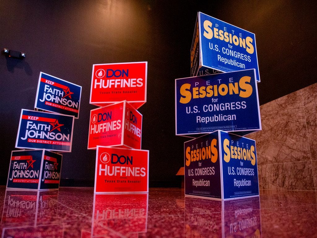 Campaign cardboards sit in the corner of the room during the victory watch party hosted by...