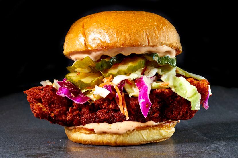 The Sandwich at Hot Chicks comes piled with fried chicken, vinegar slaw, pickles and Hot...