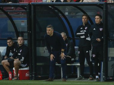 FC Dallas head coach Luchi Gonzalez, center, watches action during the first half of an MLS soccer match between FC Dallas and Philadelphia Union on Saturday, Feb. 29, 2020 at Toyota Stadium in Frisco, Texas.